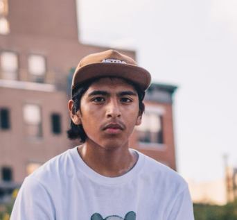 Man in cap posing